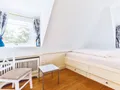 Gemütliches Schlafzimmer mit französischem Bett
